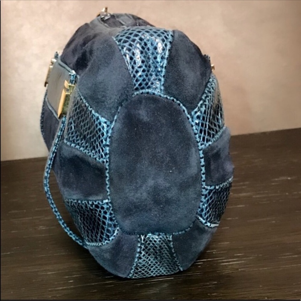 Judith Leiber Navy and Teal Clutch aaaand I DIE like Rachel Zoe. It’s Lieber.